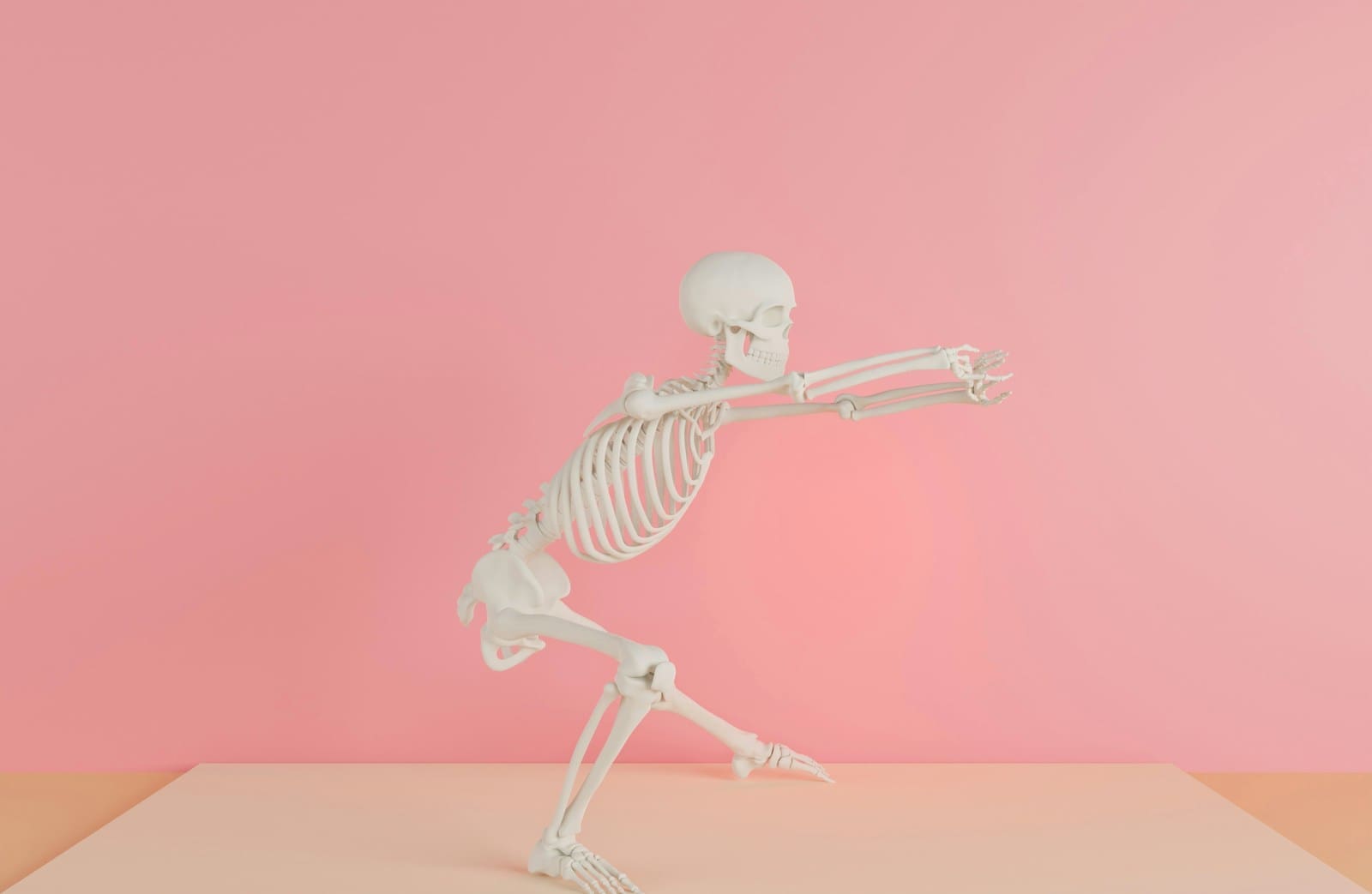 a skeleton is standing on one leg and pointing at something