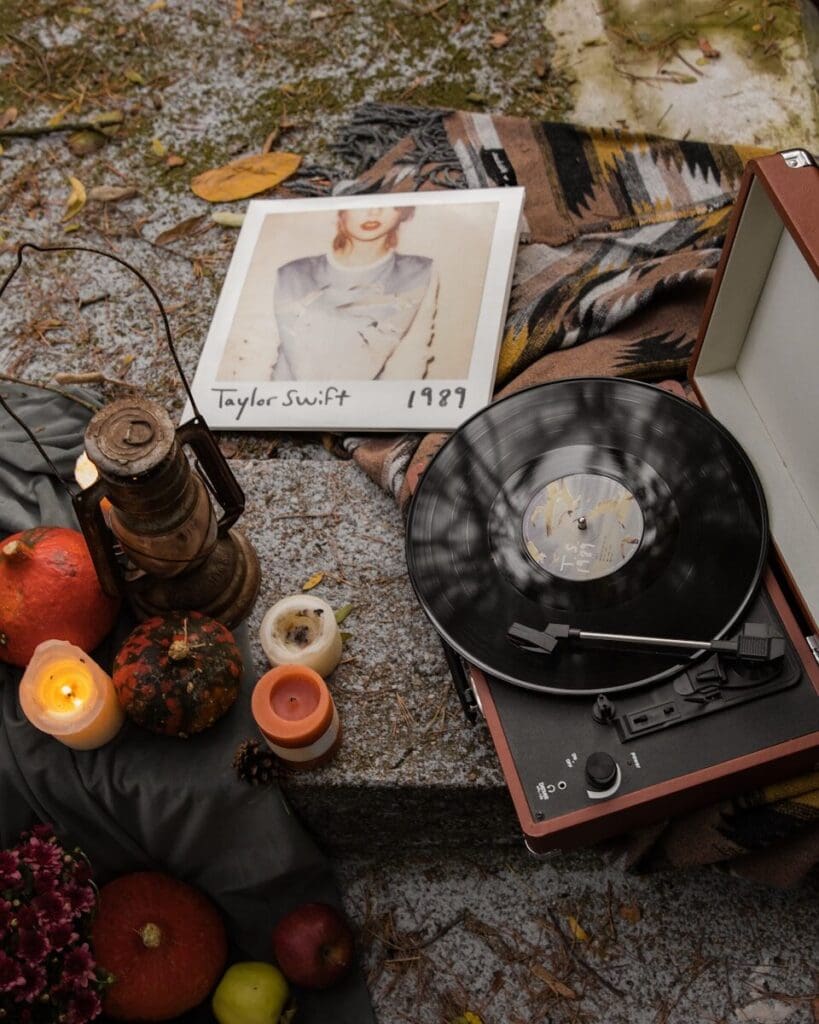 a taylor swift CD and some fruit